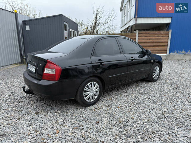 Черный Киа Черато, объемом двигателя 1.6 л и пробегом 220 тыс. км за 3300 $, фото 6 на Automoto.ua