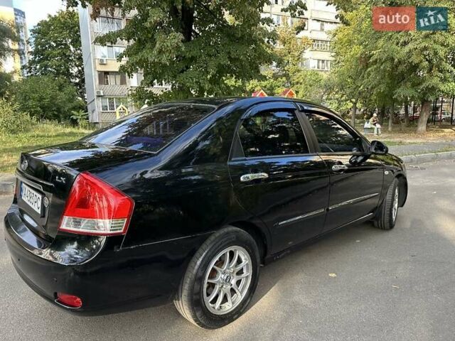 Черный Киа Черато, объемом двигателя 1.6 л и пробегом 181 тыс. км за 3900 $, фото 7 на Automoto.ua