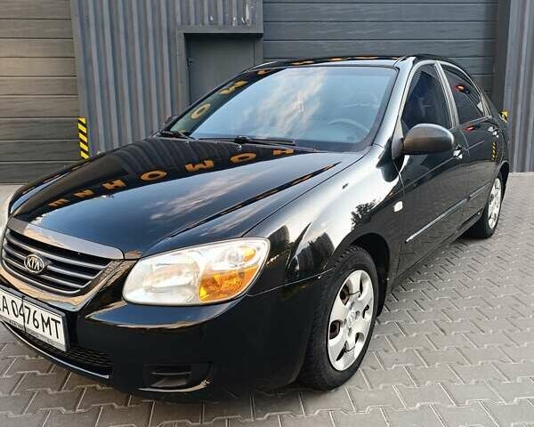 Чорний Кіа Черато, об'ємом двигуна 1.6 л та пробігом 237 тис. км за 5300 $, фото 10 на Automoto.ua