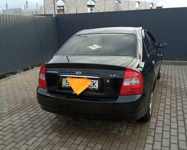 Черный Киа Черато, объемом двигателя 1.6 л и пробегом 220 тыс. км за 5400 $, фото 4 на Automoto.ua