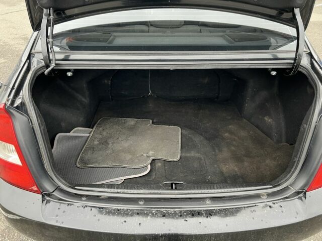 Черный Киа Черато, объемом двигателя 1.6 л и пробегом 230 тыс. км за 3200 $, фото 19 на Automoto.ua