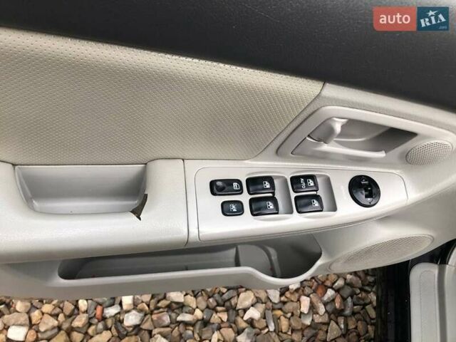 Чорний Кіа Черато, об'ємом двигуна 2 л та пробігом 177 тис. км за 4399 $, фото 10 на Automoto.ua