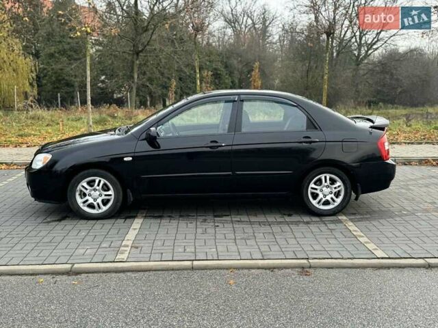 Чорний Кіа Черато, об'ємом двигуна 1.98 л та пробігом 177 тис. км за 3950 $, фото 5 на Automoto.ua