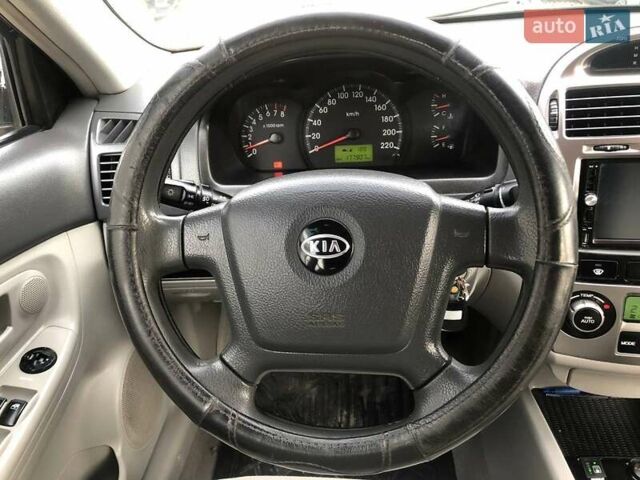 Чорний Кіа Черато, об'ємом двигуна 2 л та пробігом 177 тис. км за 4399 $, фото 27 на Automoto.ua