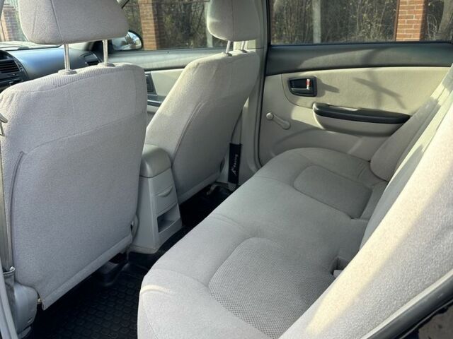 Черный Киа Черато, объемом двигателя 1.6 л и пробегом 245 тыс. км за 2850 $, фото 8 на Automoto.ua