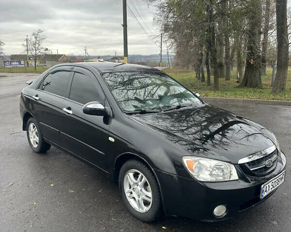 Черный Киа Черато, объемом двигателя 1.98 л и пробегом 236 тыс. км за 4100 $, фото 2 на Automoto.ua