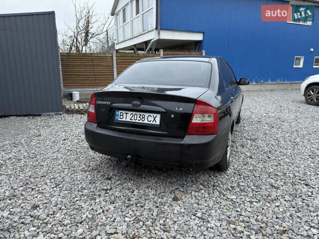 Черный Киа Черато, объемом двигателя 1.6 л и пробегом 220 тыс. км за 3300 $, фото 7 на Automoto.ua