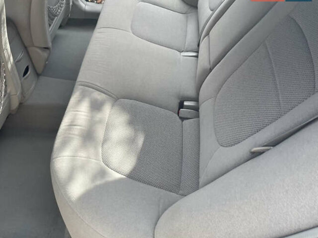 Черный Киа Черато, объемом двигателя 2 л и пробегом 318 тыс. км за 3900 $, фото 13 на Automoto.ua