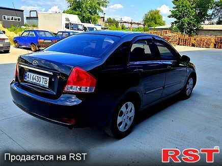 Черный Киа Черато, объемом двигателя 1.6 л и пробегом 300 тыс. км за 4000 $, фото 3 на Automoto.ua