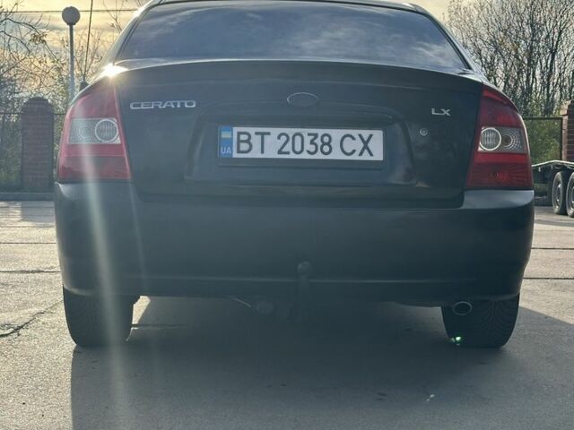 Черный Киа Черато, объемом двигателя 1.6 л и пробегом 245 тыс. км за 2850 $, фото 3 на Automoto.ua