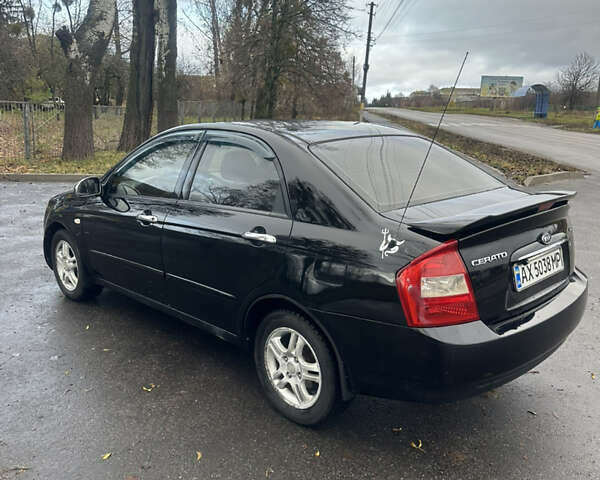 Черный Киа Черато, объемом двигателя 1.98 л и пробегом 236 тыс. км за 4100 $, фото 6 на Automoto.ua