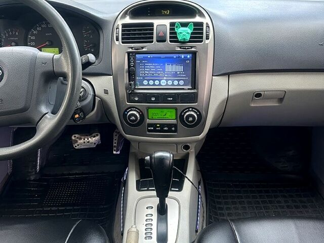 Черный Киа Черато, объемом двигателя 2 л и пробегом 232 тыс. км за 4100 $, фото 9 на Automoto.ua