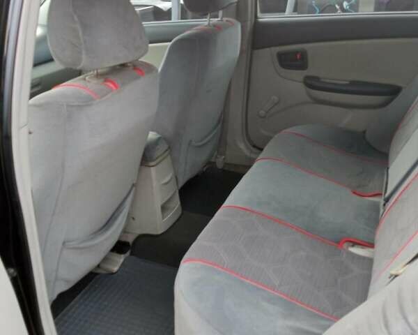 Черный Киа Черато, объемом двигателя 1.6 л и пробегом 220 тыс. км за 5400 $, фото 2 на Automoto.ua