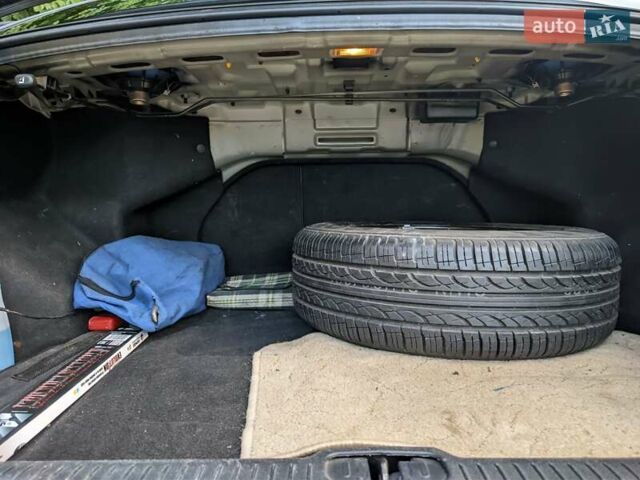 Чорний Кіа Черато, об'ємом двигуна 1.5 л та пробігом 221 тис. км за 4200 $, фото 12 на Automoto.ua