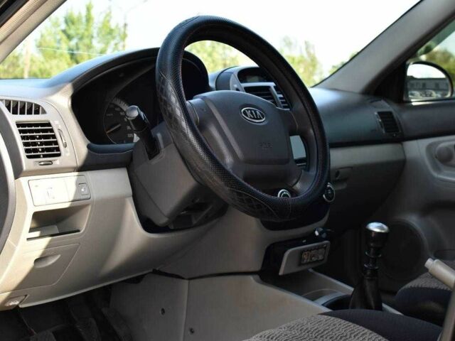 Чорний Кіа Черато, об'ємом двигуна 1.6 л та пробігом 178 тис. км за 4450 $, фото 7 на Automoto.ua
