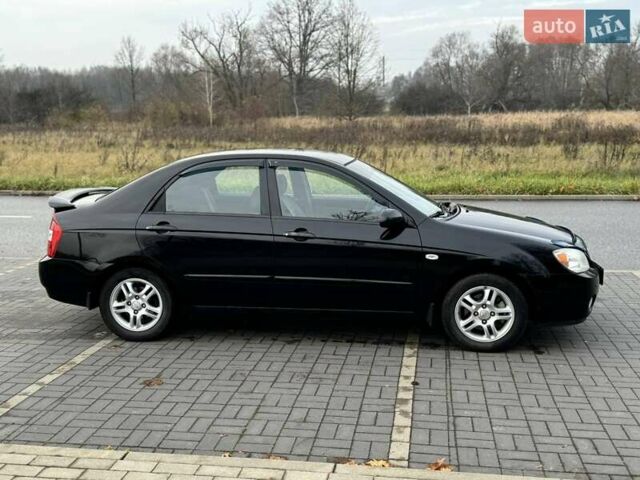 Чорний Кіа Черато, об'ємом двигуна 1.98 л та пробігом 177 тис. км за 3950 $, фото 10 на Automoto.ua