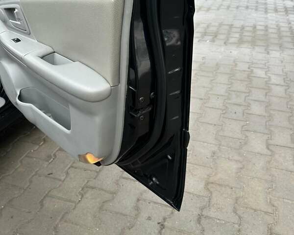 Черный Киа Черато, объемом двигателя 1.6 л и пробегом 210 тыс. км за 4500 $, фото 7 на Automoto.ua