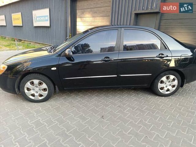 Чорний Кіа Черато, об'ємом двигуна 1.6 л та пробігом 237 тис. км за 5300 $, фото 12 на Automoto.ua