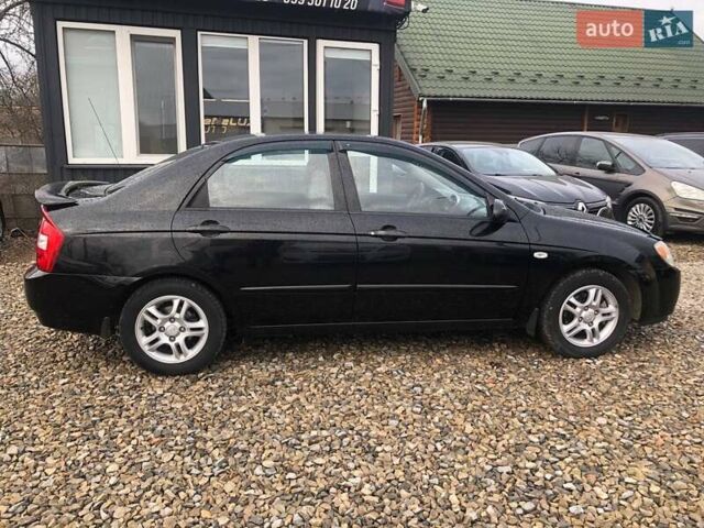 Чорний Кіа Черато, об'ємом двигуна 2 л та пробігом 177 тис. км за 4399 $, фото 8 на Automoto.ua