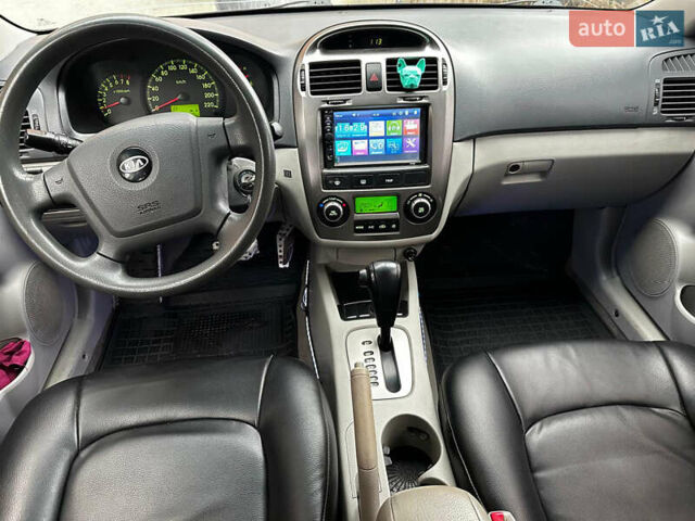 Чорний Кіа Черато, об'ємом двигуна 1.98 л та пробігом 240 тис. км за 5100 $, фото 11 на Automoto.ua