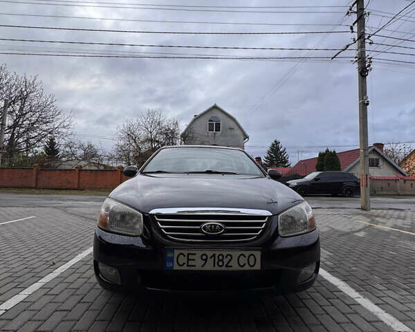 Черный Киа Черато, объемом двигателя 1.6 л и пробегом 232 тыс. км за 4300 $, фото 5 на Automoto.ua