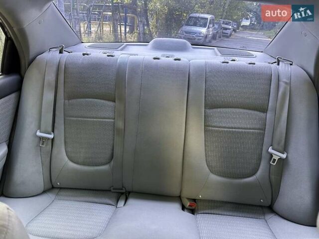 Черный Киа Черато, объемом двигателя 1.6 л и пробегом 181 тыс. км за 3900 $, фото 17 на Automoto.ua