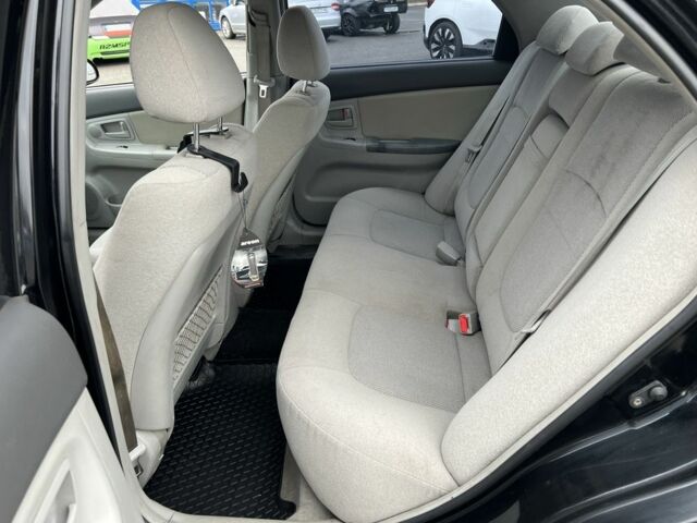 Черный Киа Черато, объемом двигателя 1.6 л и пробегом 230 тыс. км за 3200 $, фото 16 на Automoto.ua