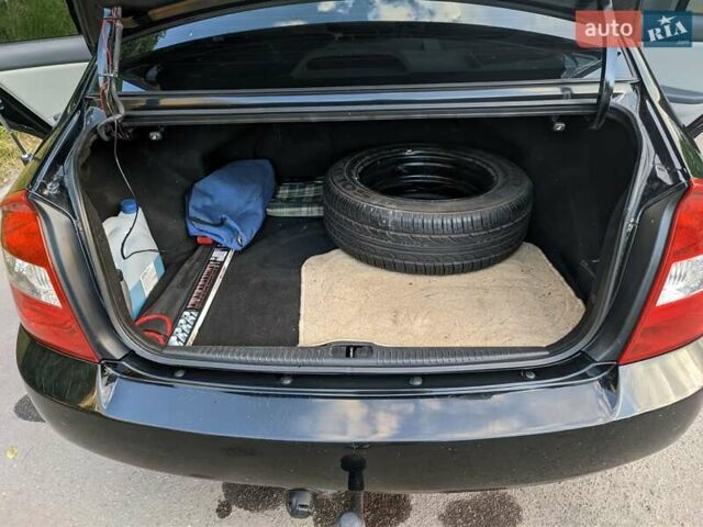 Чорний Кіа Черато, об'ємом двигуна 1.5 л та пробігом 221 тис. км за 4200 $, фото 15 на Automoto.ua