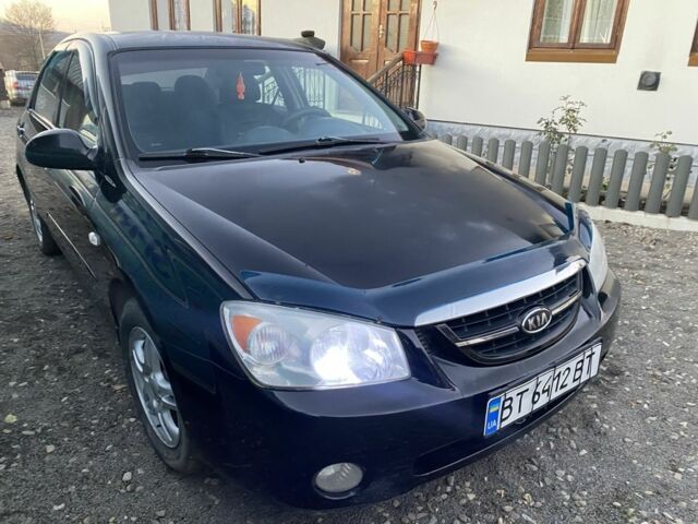 Черный Киа Черато, объемом двигателя 2 л и пробегом 240 тыс. км за 3300 $, фото 3 на Automoto.ua