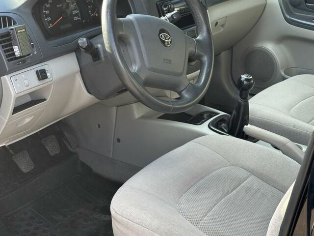 Черный Киа Черато, объемом двигателя 1.6 л и пробегом 245 тыс. км за 2850 $, фото 7 на Automoto.ua