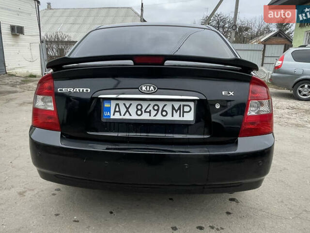 Черный Киа Черато, объемом двигателя 2 л и пробегом 318 тыс. км за 3900 $, фото 6 на Automoto.ua