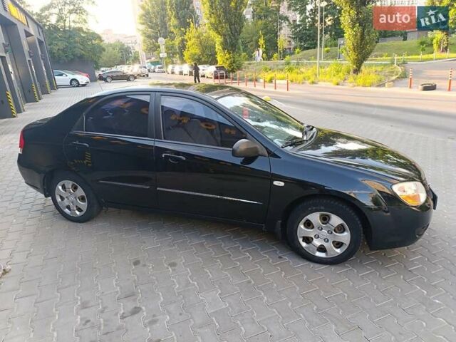 Чорний Кіа Черато, об'ємом двигуна 1.6 л та пробігом 237 тис. км за 5300 $, фото 3 на Automoto.ua