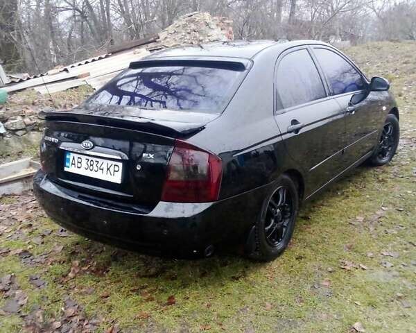 Черный Киа Черато, объемом двигателя 2 л и пробегом 240 тыс. км за 4200 $, фото 6 на Automoto.ua