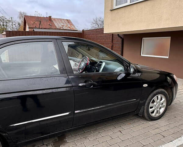 Черный Киа Черато, объемом двигателя 1.6 л и пробегом 232 тыс. км за 4300 $, фото 2 на Automoto.ua