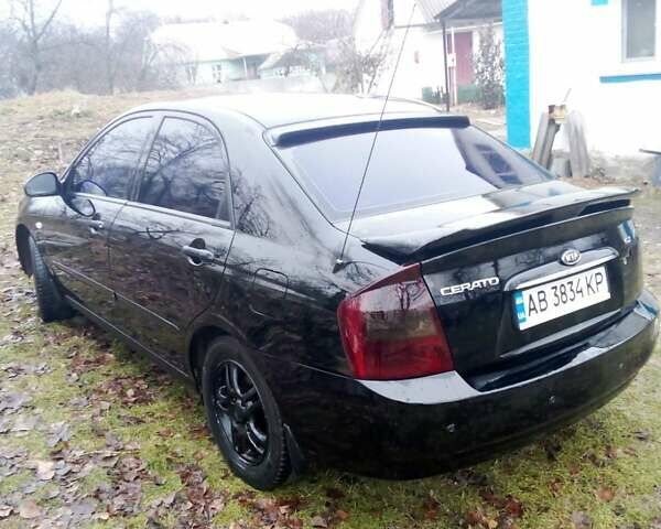 Черный Киа Черато, объемом двигателя 2 л и пробегом 240 тыс. км за 4200 $, фото 8 на Automoto.ua