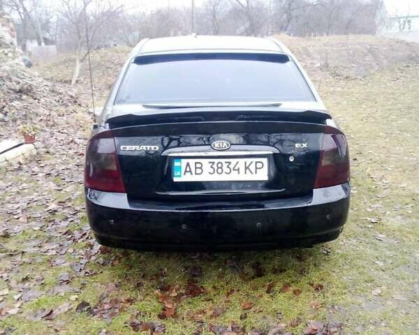 Черный Киа Черато, объемом двигателя 2 л и пробегом 240 тыс. км за 4200 $, фото 7 на Automoto.ua