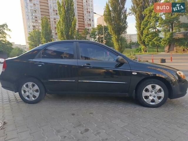 Чорний Кіа Черато, об'ємом двигуна 1.6 л та пробігом 237 тис. км за 5300 $, фото 4 на Automoto.ua
