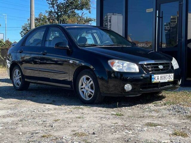 Черный Киа Черато, объемом двигателя 2 л и пробегом 268 тыс. км за 4200 $, фото 4 на Automoto.ua