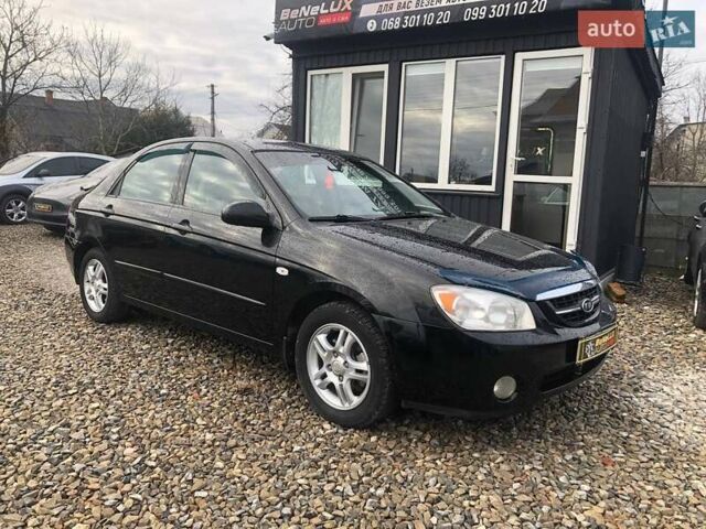 Чорний Кіа Черато, об'ємом двигуна 2 л та пробігом 177 тис. км за 4399 $, фото 9 на Automoto.ua