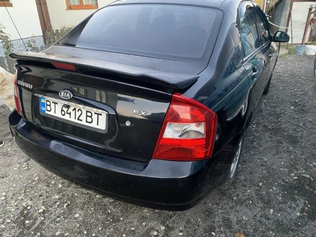 Черный Киа Черато, объемом двигателя 2 л и пробегом 240 тыс. км за 3300 $, фото 2 на Automoto.ua