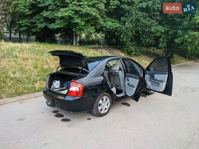 Чорний Кіа Черато, об'ємом двигуна 1.5 л та пробігом 221 тис. км за 4200 $, фото 8 на Automoto.ua