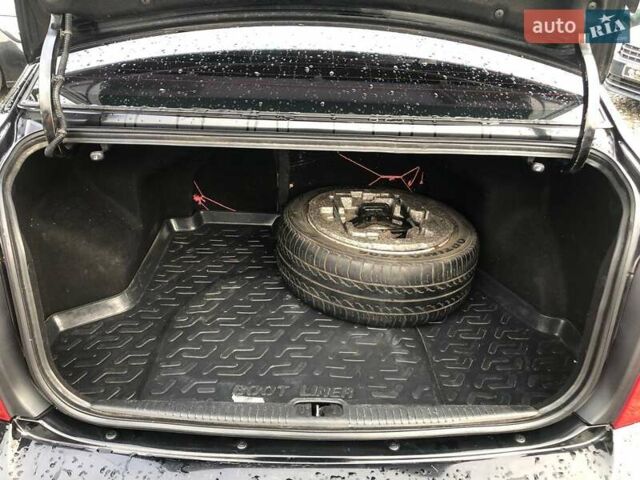 Чорний Кіа Черато, об'ємом двигуна 2 л та пробігом 177 тис. км за 4399 $, фото 19 на Automoto.ua