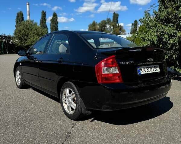 Черный Киа Черато, объемом двигателя 2 л и пробегом 268 тыс. км за 5200 $, фото 2 на Automoto.ua