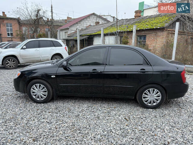 Черный Киа Черато, объемом двигателя 1.6 л и пробегом 220 тыс. км за 3300 $, фото 11 на Automoto.ua
