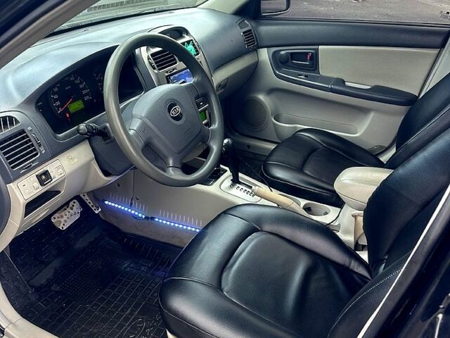 Черный Киа Черато, объемом двигателя 2 л и пробегом 232 тыс. км за 4100 $, фото 8 на Automoto.ua