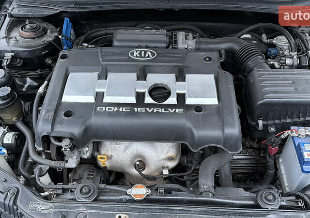 Черный Киа Черато, объемом двигателя 1.6 л и пробегом 220 тыс. км за 3300 $, фото 20 на Automoto.ua