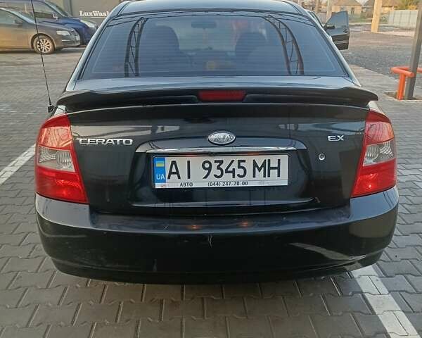 Черный Киа Черато, объемом двигателя 1.6 л и пробегом 230 тыс. км за 4250 $, фото 2 на Automoto.ua