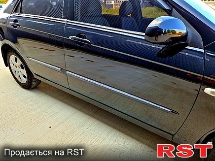 Черный Киа Черато, объемом двигателя 1.6 л и пробегом 300 тыс. км за 4000 $, фото 5 на Automoto.ua