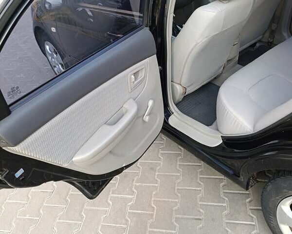 Чорний Кіа Черато, об'ємом двигуна 1.6 л та пробігом 237 тис. км за 5300 $, фото 21 на Automoto.ua