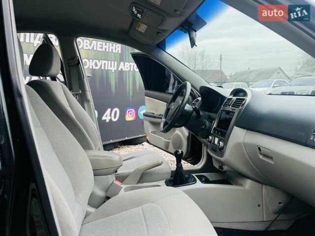 Чорний Кіа Черато, об'ємом двигуна 2 л та пробігом 319 тис. км за 4300 $, фото 18 на Automoto.ua